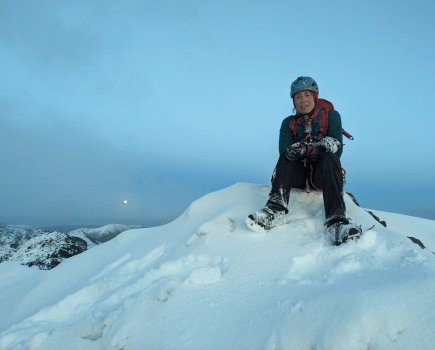 Winter Munro Round - A rare capture of Anna looking very tired on the summit of Sgurr a' Mhadaidh after a huge day climbing the southern 8 Cuillin Munros in technical condition. Photo by Anna Wells